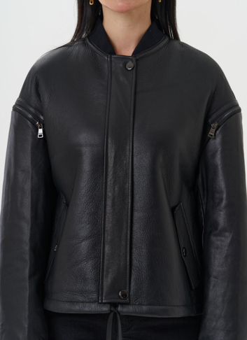 Кожаная дубленка с акцентными молниями